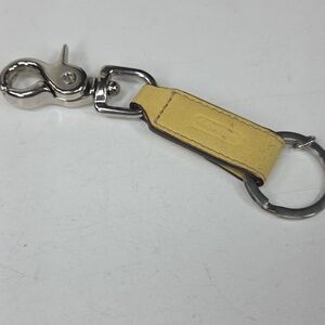 vtg coach trigger keychain butter yellow mustard silver tone 90s y2k leather